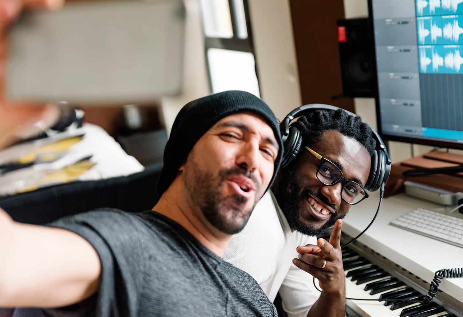 Happy people creating and celebrating their music
